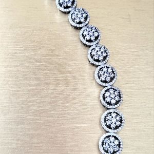 Brand new designer inspired bracelet with CZ stones. Looks gorgeous in person